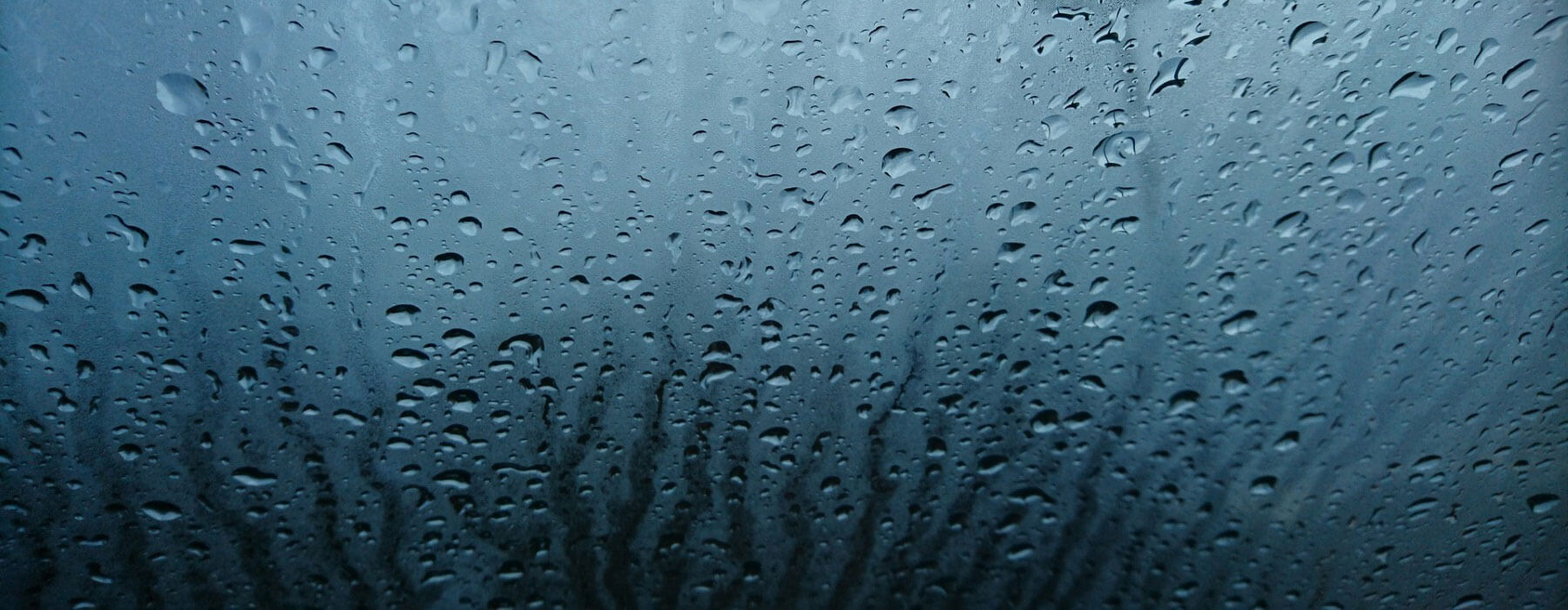 Cool blue condensation on glass