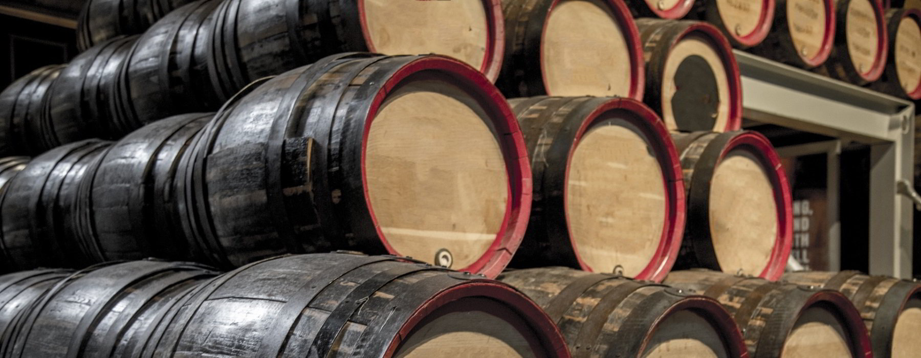Barrels for aging stacked high.